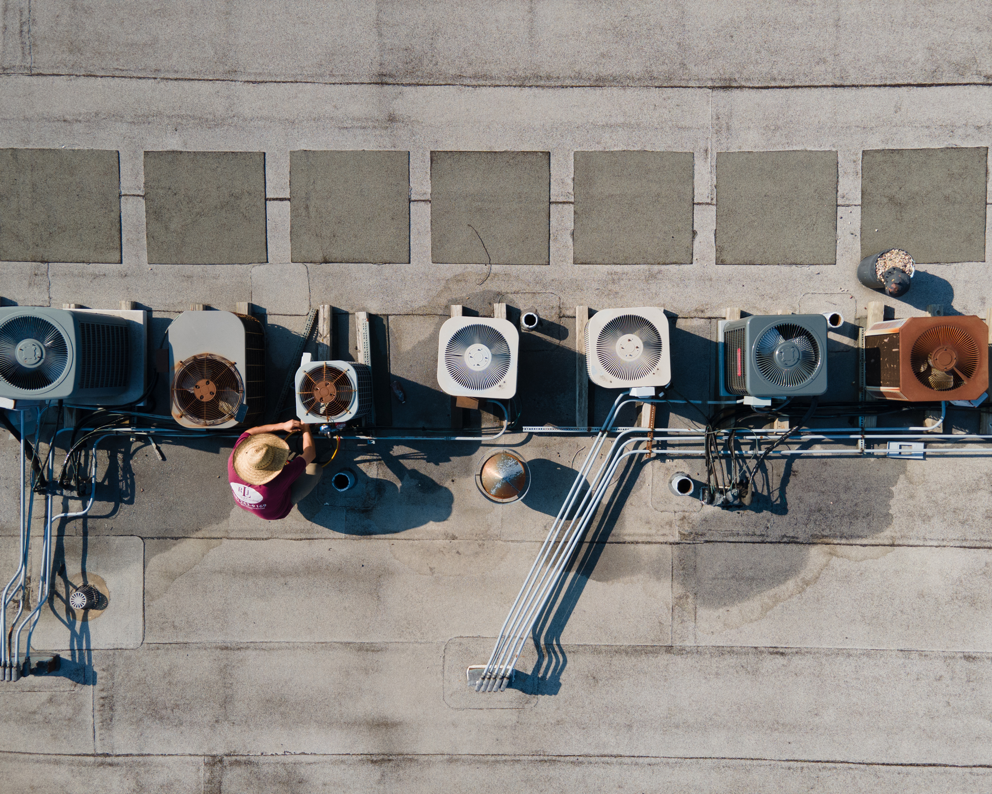 hvac technician on roof