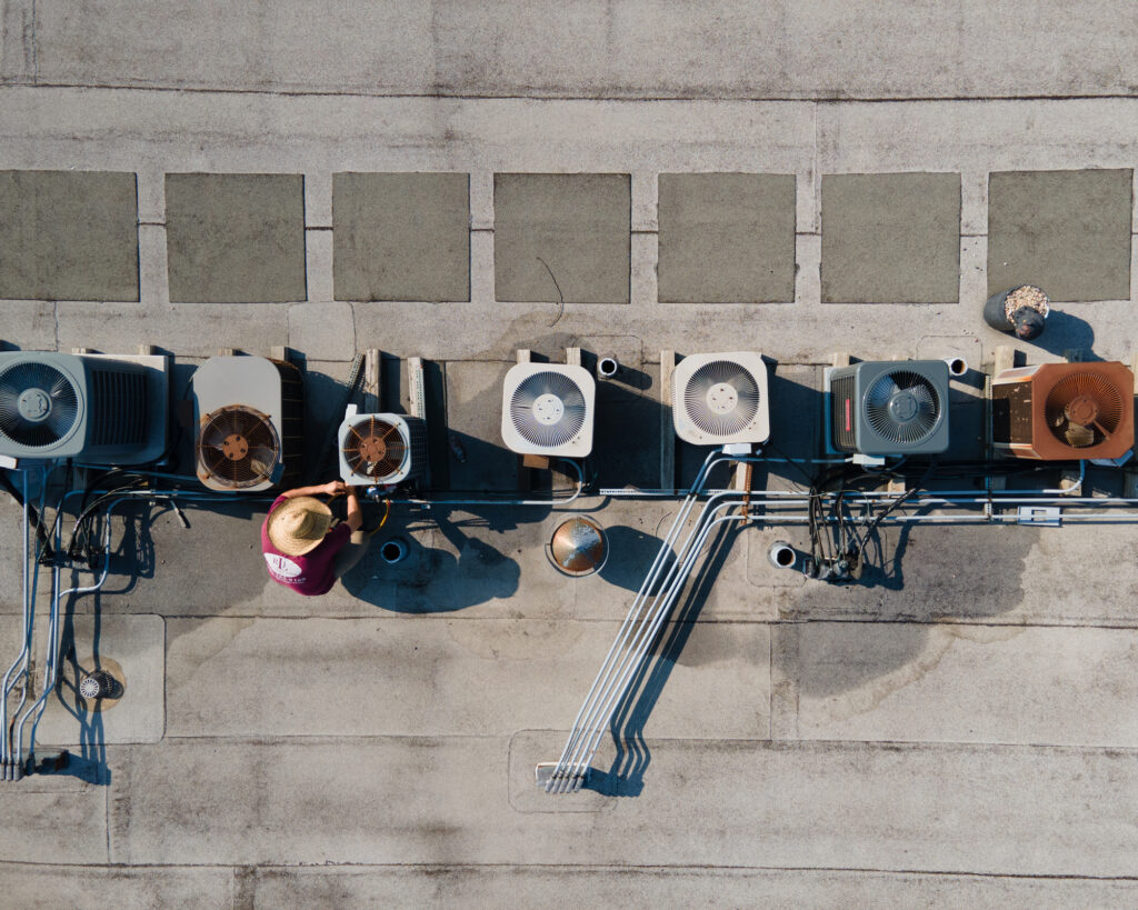 Construction Worker servicing a hvac system