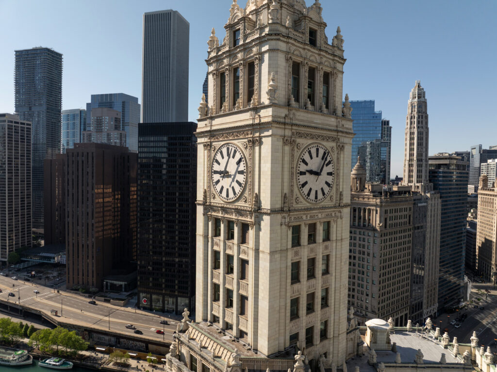 Downtown aerial image of Chicago of top of Wrigley Building Clock